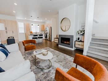 Open living area with a fireplace 